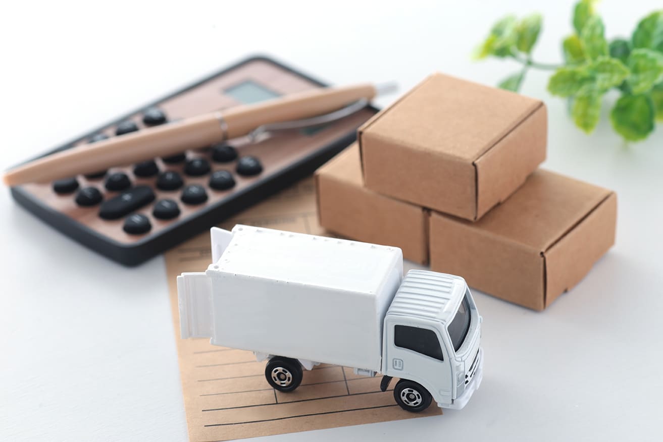 Camion miniature cartons et calculette